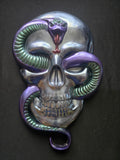 Skull with snake wall art